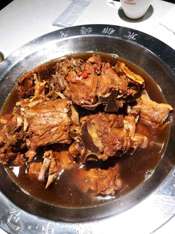 京都蝎府羊蝎子火锅是个连锁店在东铁营桥东南角新开的店开业送优惠券