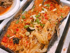 -明何记涮牛肚(品牌首店隋唐植物园南门古城路店)