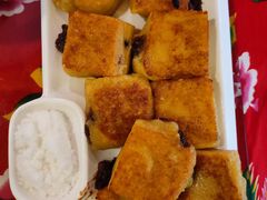 煎粘豆包-闯关东东北农家菜(崂山石老人店)