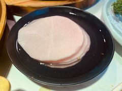 腌萝卜片-猪啊牛呀羊啊铜盘烤肉(正大广场店)