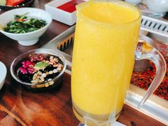 鲜榨芒果汁-大隐·成都火锅Bistro(合生麒麟新天地店)