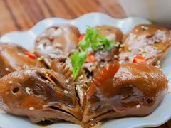 -梁老三麻辣鸡头总店