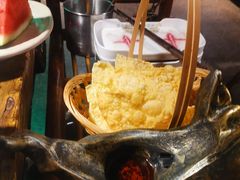 -老牌坊云南鱼豆花火锅(哈西万达店)