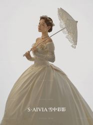 -雪中彩影婚纱摄影·微光艺术中心