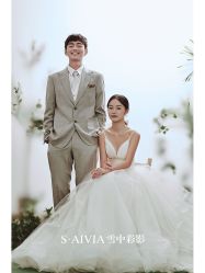 -雪中彩影婚纱摄影·微光艺术中心