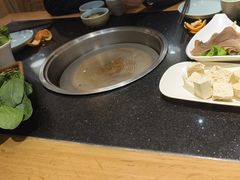 -明何记涮牛肚(品牌首店隋唐植物园南门古城路店)