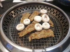 烤口蘑-草家酱蟹炭火烤肉店(珲春南路一店)