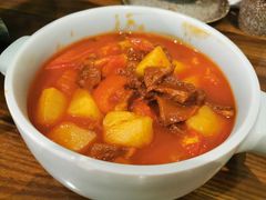 番茄土豆绘牛腩-又见小河浜·盐帮川菜(松江商业广场店)