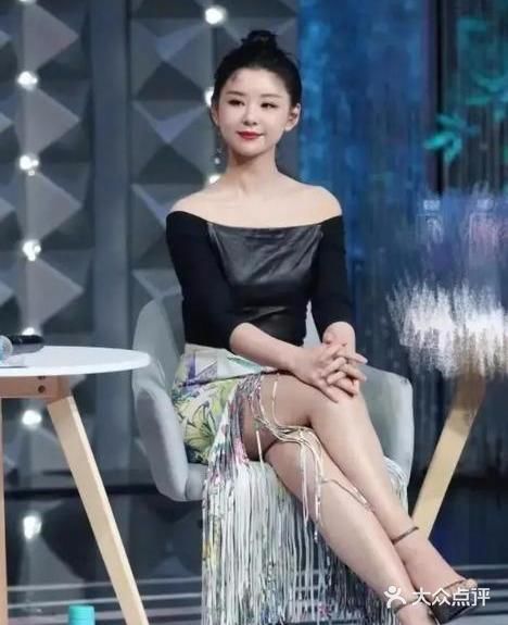 本来就162的身高,让她看起上去不光显矮