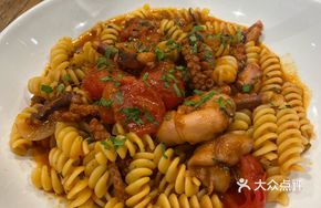 Spicy Octopus with Onion Tomato Sauce and Spiral Noodles