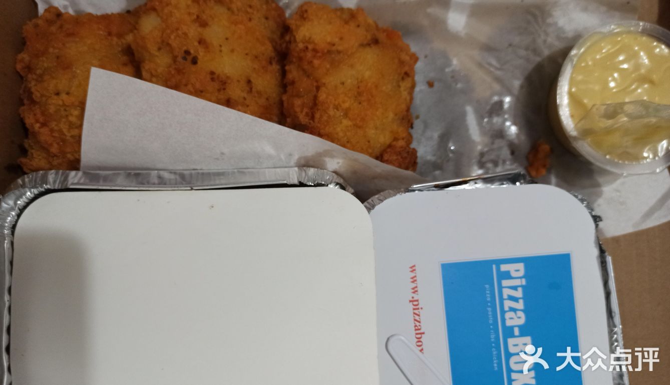 第一次尝试这一家pizza. 店