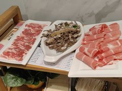 -明何记涮牛肚(品牌首店隋唐植物园南门古城路店)