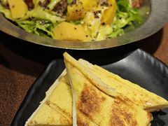 -曼听小寨海鲜烧烤·大连辣炒大王(盖州街店)