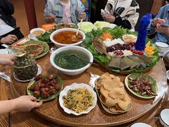 -沐毫傣泐云南菜孔雀宴•手抓饭傣味烧烤(曼听公园店)