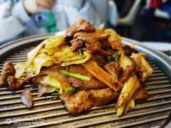经典葱爆小羔羊肉-悦融·京鲁菜·露台花园(安定门店)