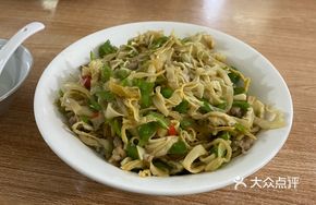 Crispy Bamboo Shoots with Pork over Rice