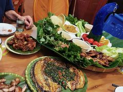 -沐毫傣泐云南菜孔雀宴•手抓饭傣味烧烤(曼听公园店)