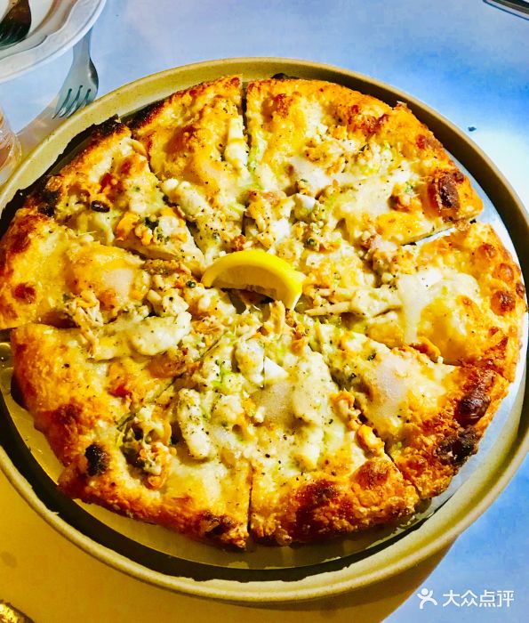 食光西餐厅scarpetta招牌蛏子蛤蜊披萨图片