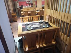 -明何记涮牛肚(品牌首店隋唐植物园南门古城路店)