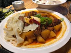 沙湾大盘鸡-塔哈尔·新疆盛宴(城西银泰店)