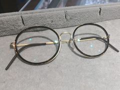 -黄益静眼镜行