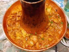 土司铜锅油焖鸡-浩海火烧云傣家菜(京广店)