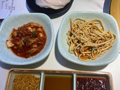 腌萝卜片-猪啊牛呀羊啊铜盘烤肉(正大广场店)