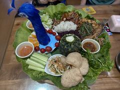 -沐毫傣泐云南菜孔雀宴•手抓饭傣味烧烤(曼听公园店)