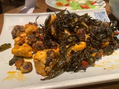 普洱茶炒包浆豆腐-云海肴·汽锅鸡·云南菜(天山百盛优客店)