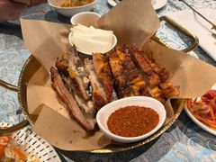 馕坑烤羊排-巴扎美食·新疆菜·西域歌舞表演餐厅(新疆大厦店)