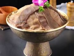 -明何记涮牛肚(品牌首店隋唐植物园南门古城路店)
