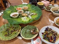 -沐毫傣泐云南菜孔雀宴•手抓饭傣味烧烤(曼听公园店)