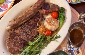 Signature Aged Bone-In Ribeye Steak with Short Handle Axe Cut