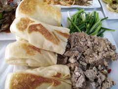 -渔民船说·北塘海鲜·天津菜·海肠捞饭(北塘古镇店)