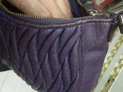 -京伟修鞋洗鞋奢侈品皮具护理店