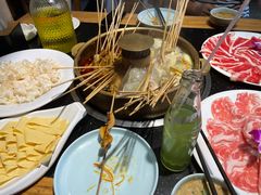 -明何记涮牛肚(品牌首店隋唐植物园南门古城路店)