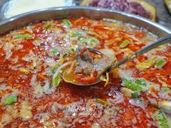 -黄利砖万峰林布依特色酸笋牛肉馆