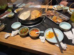 -明何记涮牛肚(品牌首店隋唐植物园南门古城路店)
