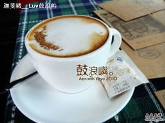 码头吧的咖啡和边上明信片-娜娜度假小旅馆