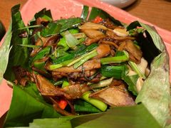 包烧野生牛肝菌-云海肴·汽锅鸡·云南代表菜(天山百盛优客店)