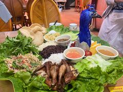 -沐毫傣泐云南菜孔雀宴•手抓饭傣味烧烤(曼听公园店)