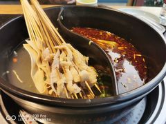 -明何记涮牛肚(品牌首店隋唐植物园南门古城路店)