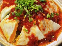 凉拌荷包蛋-浩海火燒雲傣家菜(芮欧百货店)