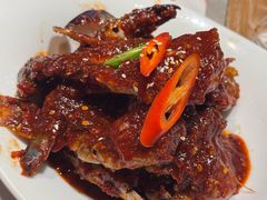 草家招牌酱辣蟹-草家酱蟹炭火烤肉店(珲春南路一店)