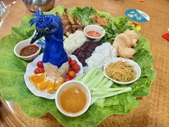 -沐毫傣泐云南菜孔雀宴•手抓饭傣味烧烤(曼听公园店)