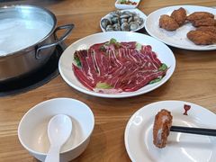 鲜牛展-吉友粥底火锅(方斜路店)