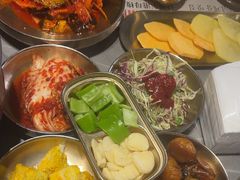 -草家酱蟹炭火烤肉店(珲春南路一店)