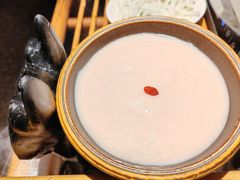 -老牌坊云南鱼豆花火锅(哈西万达店)