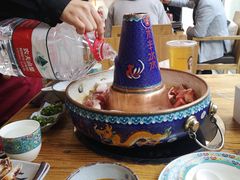 -毛辣果·贵州红酸汤牛肉火锅(西单店)
