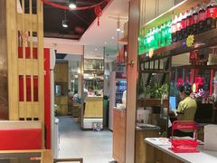 -明何记涮牛肚(品牌首店隋唐植物园南门古城路店)